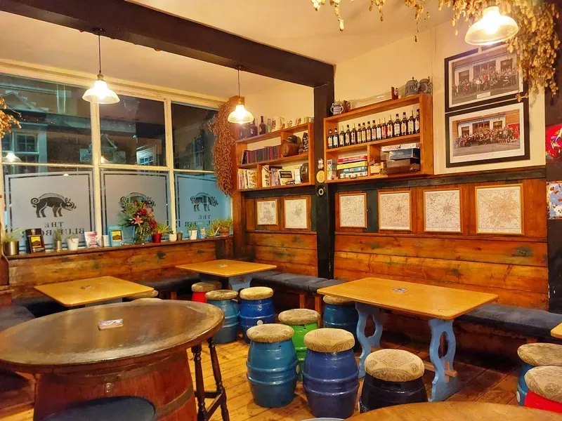 Inside The Blue Boar — barrel stools, banquettes and old maps of Leicester